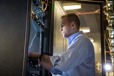 IT Service Professional Working on Server